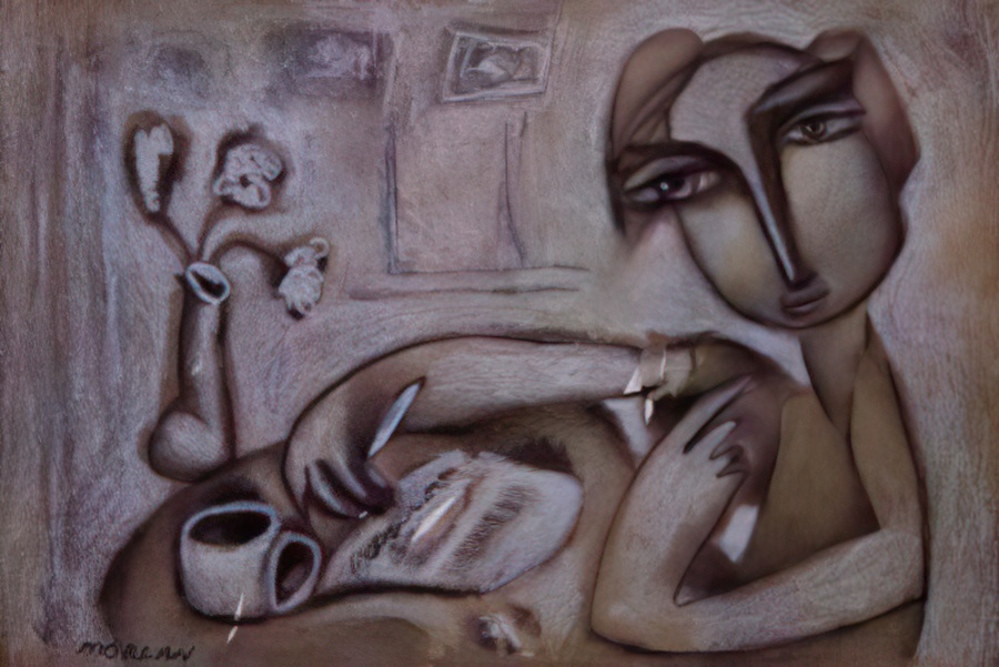A person writing at the New Bohemian Coffee House.